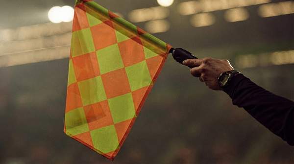 Editorial illustration for How One Line in the Offside Law Rewrote Football's Tactics